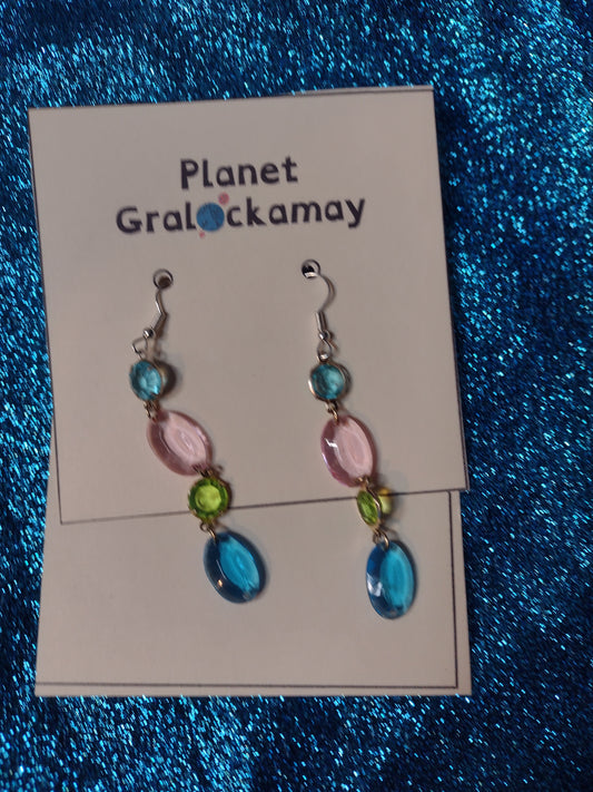 Multi Colored Drop Earrings. Made with a surgical steel hook. The earrings are made up of four different plastic jewels green, dark blue, light blue and pink