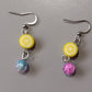 Lemon Drop Earrings with a lemon slice made of Polymer clay and a multi colored glass bead.