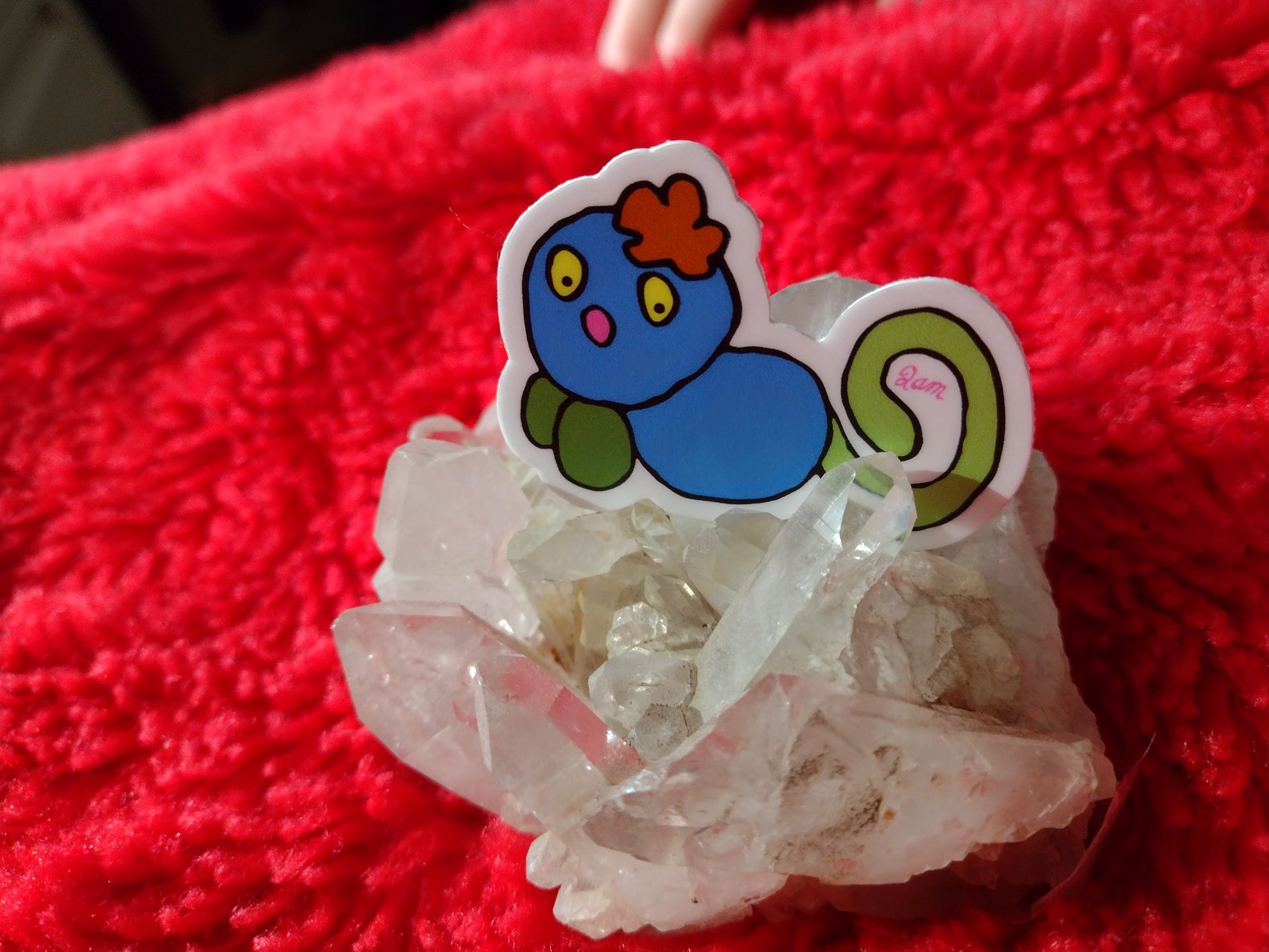 Blue Gralockamay sticker on a quartzite Cristal.