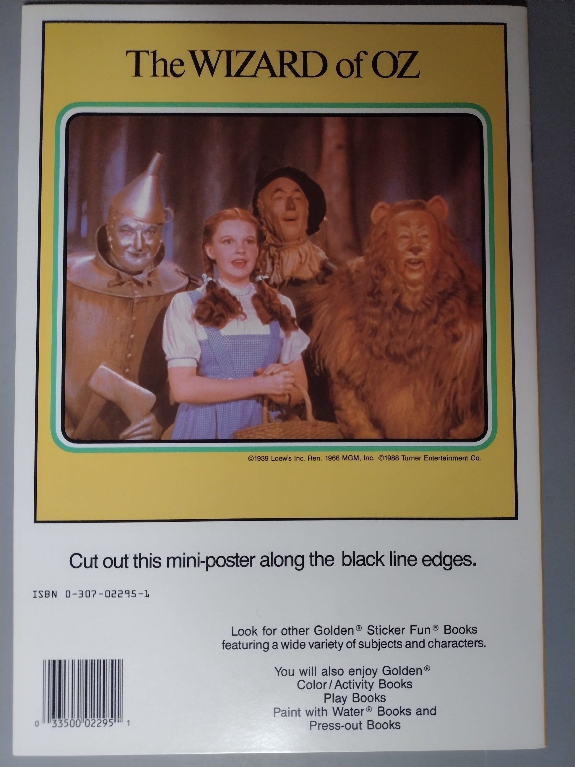 The Wizard of Oz.  The back has a picture of Dorothy and here friends. Cut out this mini-poster along the black line edges. 