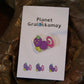 Purple Gralockamay Pin on card.